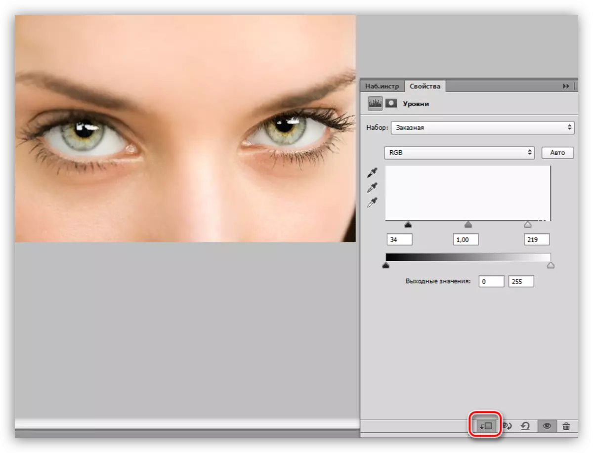 Botó d'unió a un correctiu nivells de capa a una capa amb els ulls en Photoshop