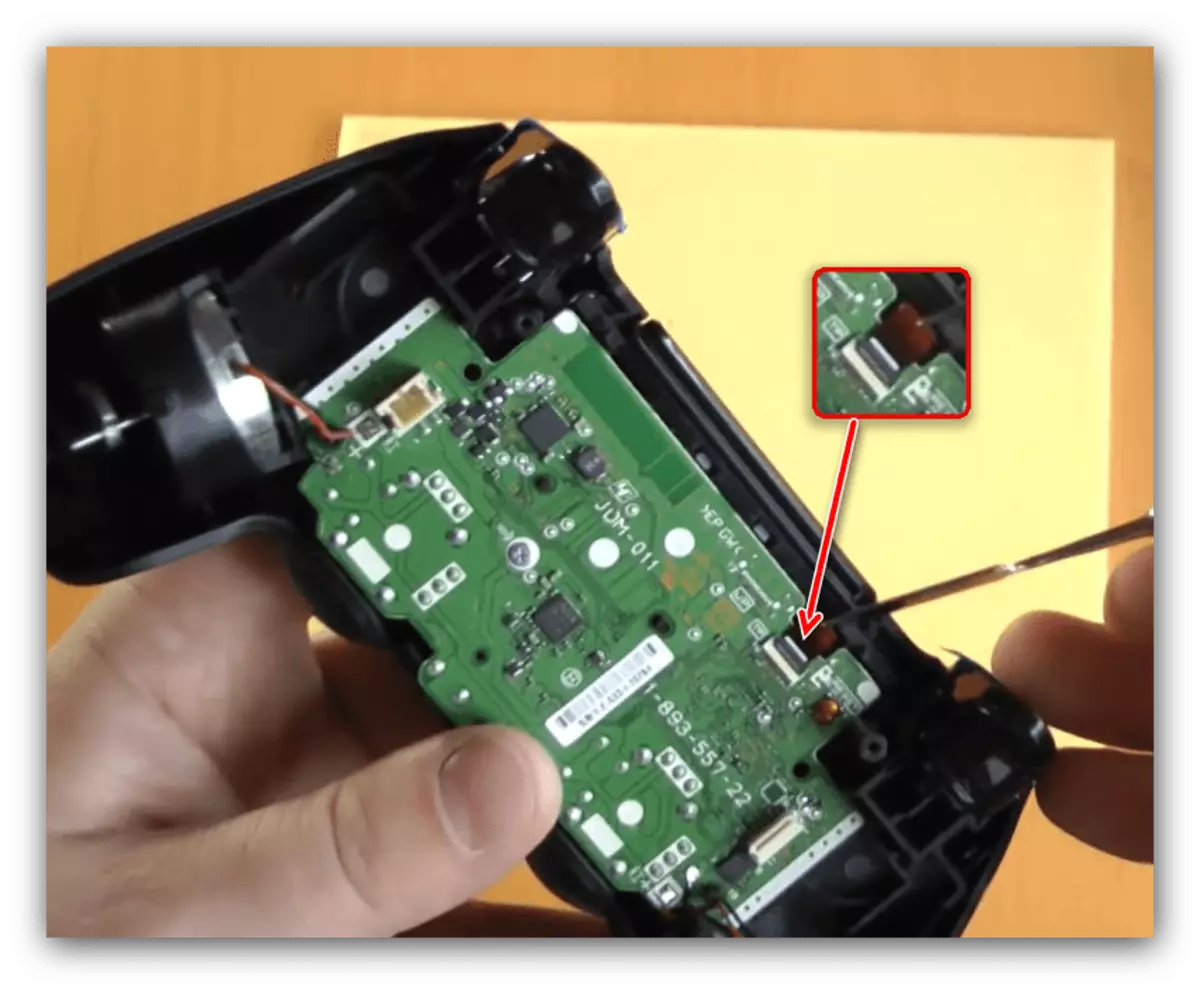 Disconnect the touch panel loop for disassembling the first revision joystick PS4