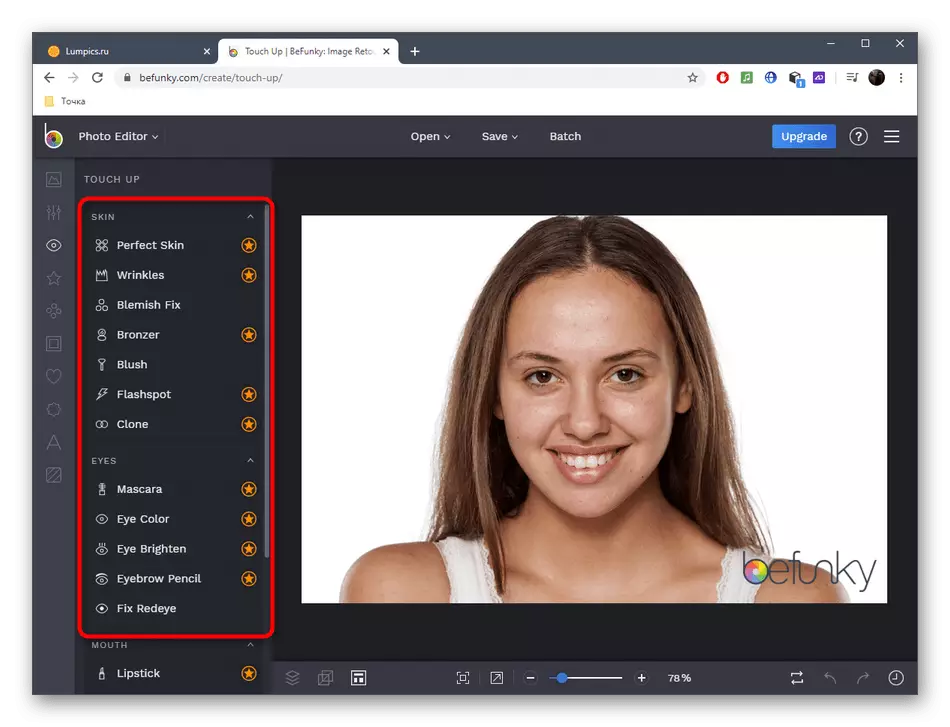Seleccionando unha ferramenta para editar unha cara nunha foto a través do servizo en liña befunky