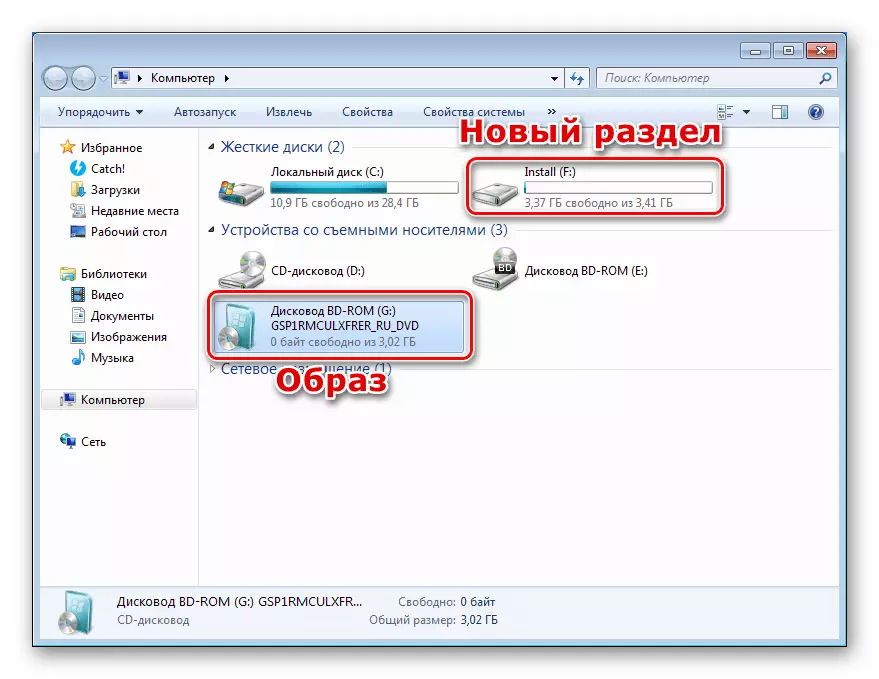 Immaġni immuntata bid-distribuzzjoni u volum ġdid fil-folder tal-kompjuter Windows 7