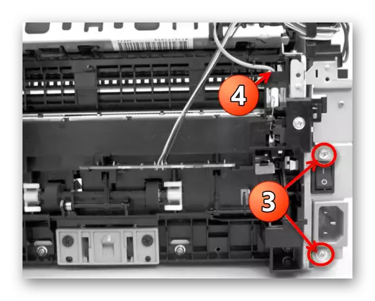 Dekonekte fil la segondè-vòltaj nan printer a Canon lè demonte