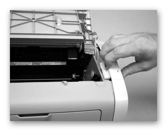 Scoaterea capacului lateral al imprimantei Canon cu dezasamblarea completă