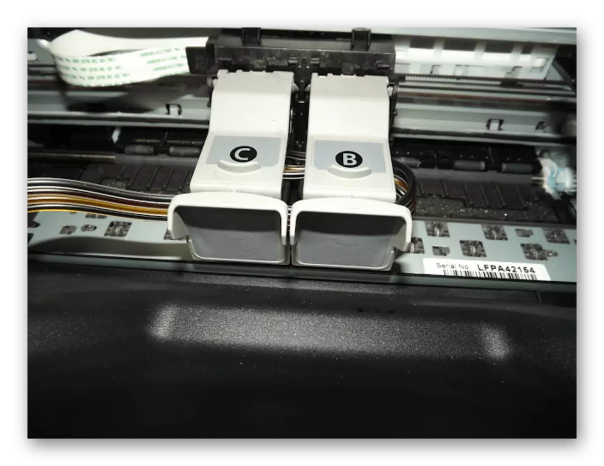 Ukufaka i-CFCH PLUME ngemuva kokufaka ama-cartridge eCanon Pixma MP250 Printer