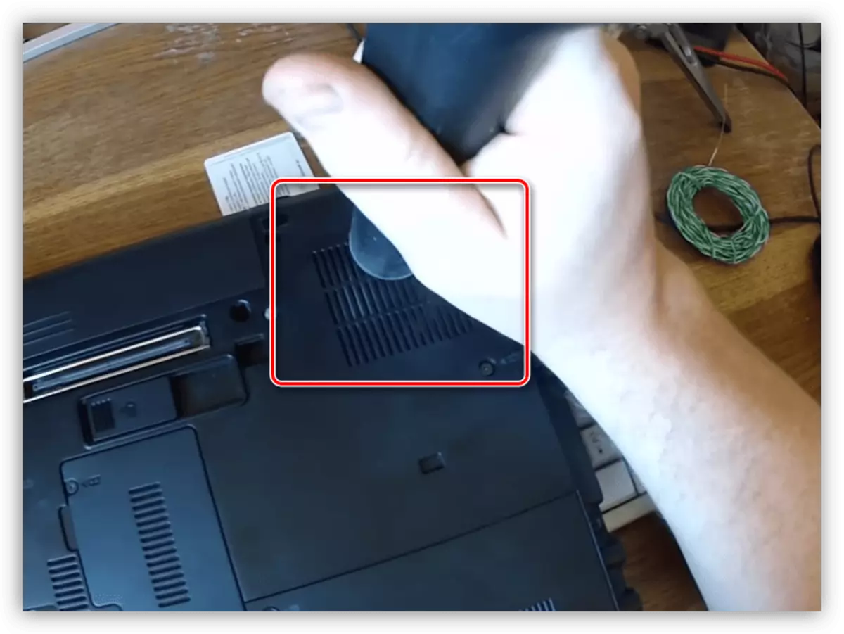 Removal of dust from a laptop cooling system with a vacuum cleaner