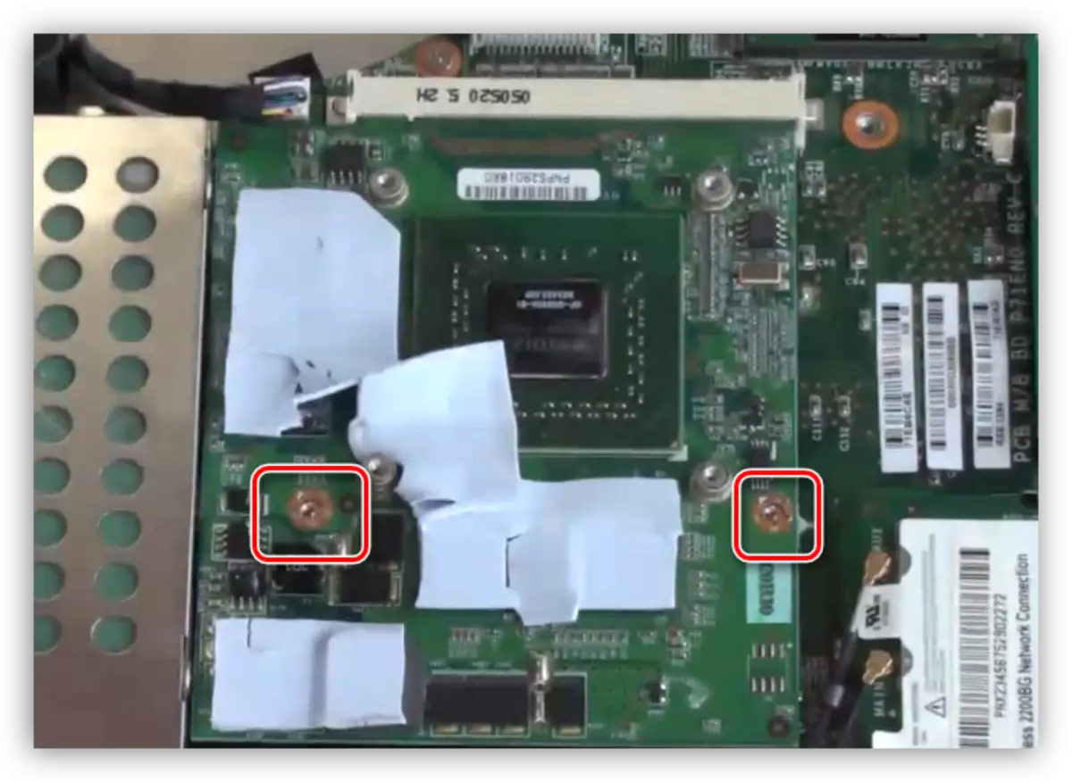 Revealing screws of the discrete video card in a laptop