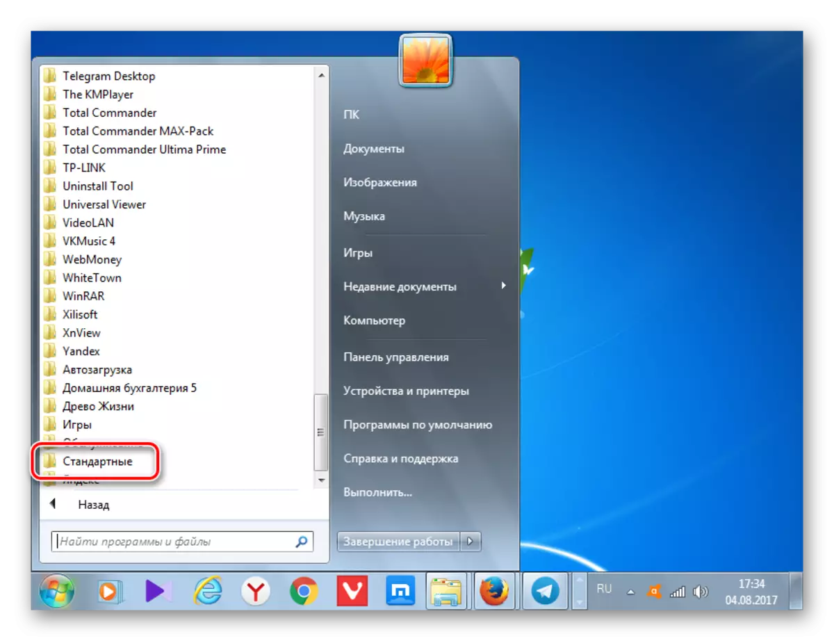 Gå til standardprogrammappen Via Start-menuen i Windows 7