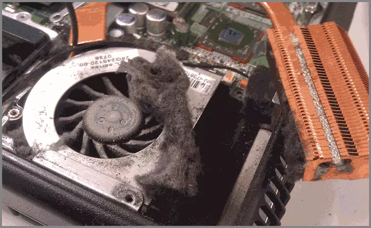 Dust in the cooling system of the laptop
